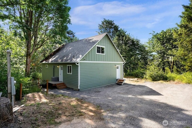 2927 Youngs Rd, Custer, WA 98240 - rear view of property with board and batten siding and roof with shingles