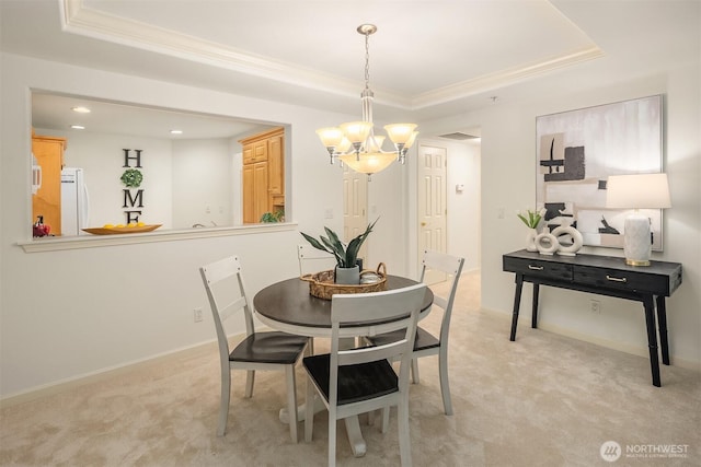4535 Providence Point Pl SE Unit 202, Issaquah, WA 98029 - dining space with a raised ceiling, a chandelier, light carpet, ornamental molding, and recessed lighting