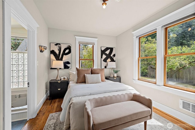 734 N 75th St, Seattle, WA 98103 - bedroom with wood finished floors and baseboards