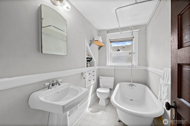 734 N 75th St, Seattle, WA 98103 - full bathroom featuring a soaking tub and tile patterned floors