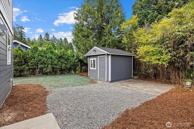 4955 Henley St, Blaine, WA 98230 - view of grassy yard with a storage unit and a patio area