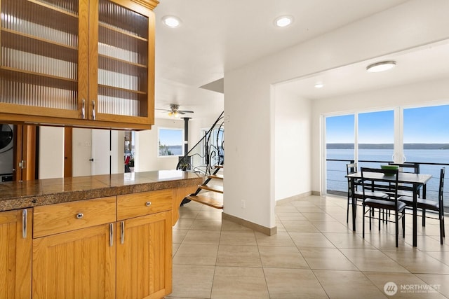 6522 Whitman St NE, Tacoma, WA 98422 - kitchen featuring tile counters, light tile patterned floors, glass insert cabinets, recessed lighting, and a ceiling fan