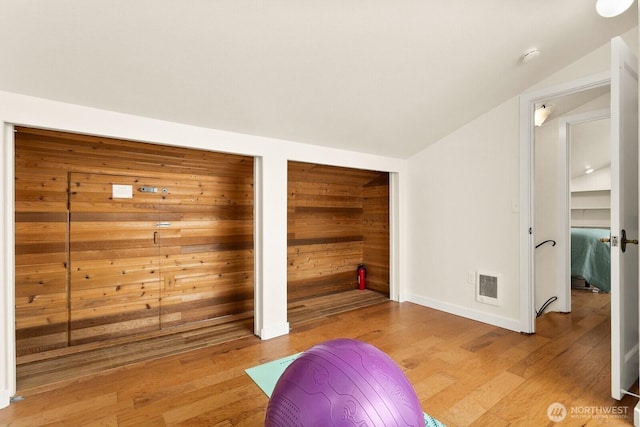 6522 Whitman St NE, Tacoma, WA 98422 - workout room featuring lofted ceiling and light wood-style floors