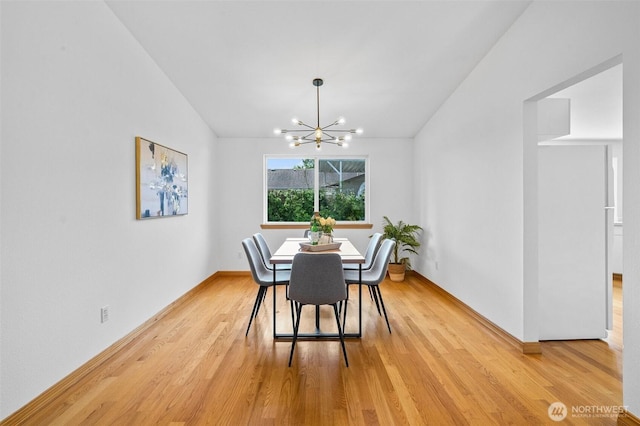 15120 61st St E, Sumner, WA 98390 - dining room with light wood-type flooring, a chandelier, and lofted ceiling