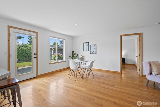 15120 61st St E, Sumner, WA 98390 - dining room with light wood-type flooring and baseboards