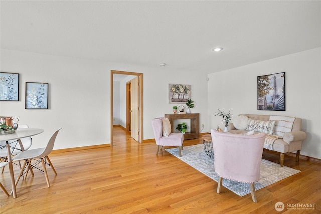 15120 61st St E, Sumner, WA 98390 - living room featuring light wood-style flooring and recessed lighting