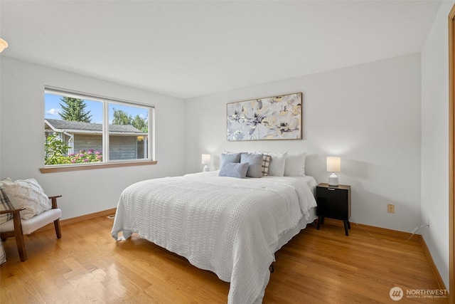 15120 61st St E, Sumner, WA 98390 - bedroom with light wood-style flooring
