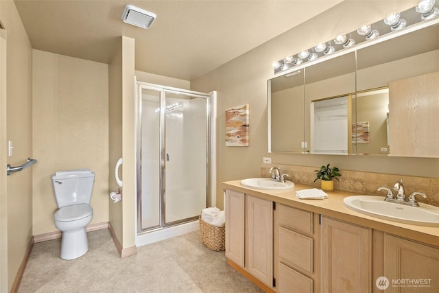 15120 61st St E, Sumner, WA 98390 - bathroom featuring a stall shower and double vanity
