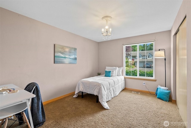 15120 61st St E, Sumner, WA 98390 - bedroom featuring carpet flooring, a chandelier, and a closet