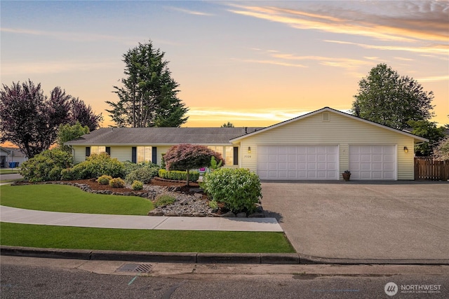 15120 61st St E, Sumner, WA 98390 - ranch-style house featuring a garage, driveway, and a front yard