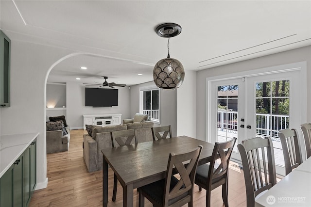 8209 188th Ave E, Bonney Lake, WA 98391 - dining room with a ceiling fan, light wood-style floors, arched walkways, french doors, and recessed lighting