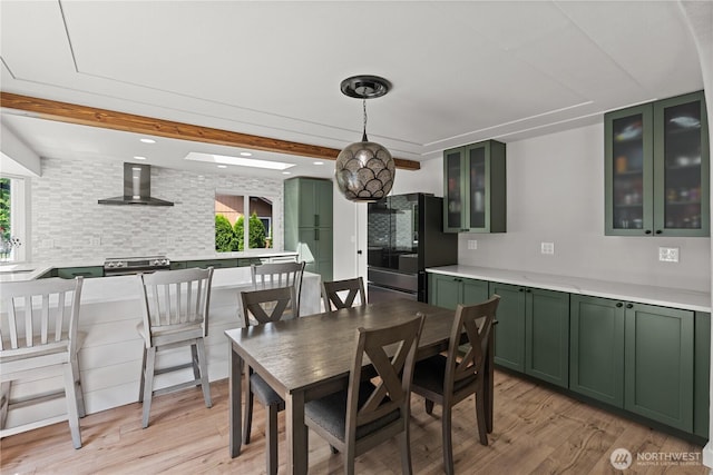8209 188th Ave E, Bonney Lake, WA 98391 - dining room with plenty of natural light, light wood finished floors, beam ceiling, and recessed lighting