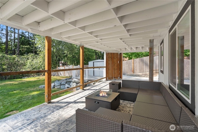 8209 188th Ave E, Bonney Lake, WA 98391 - fenced backyard featuring a patio area, a storage shed, and an outdoor living space with a fire pit