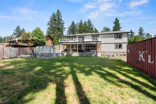 8209 188th Ave E, Bonney Lake, WA 98391 - rear view of property featuring a shed and a balcony