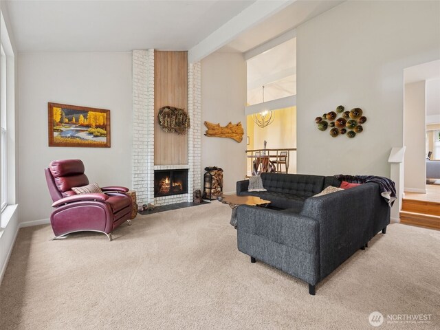 20801 Marine View Dr SW, Normandy Park, WA 98166 - living area with carpet flooring, a brick fireplace, high vaulted ceiling, and beam ceiling