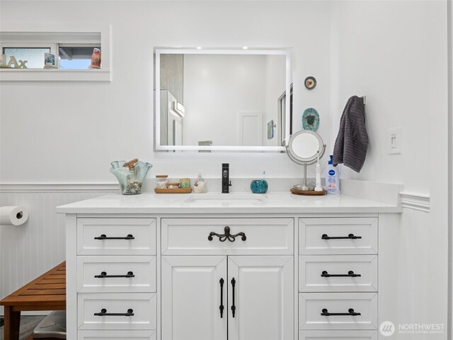 20801 Marine View Dr SW, Normandy Park, WA 98166 - bathroom with vanity and a wainscoted wall