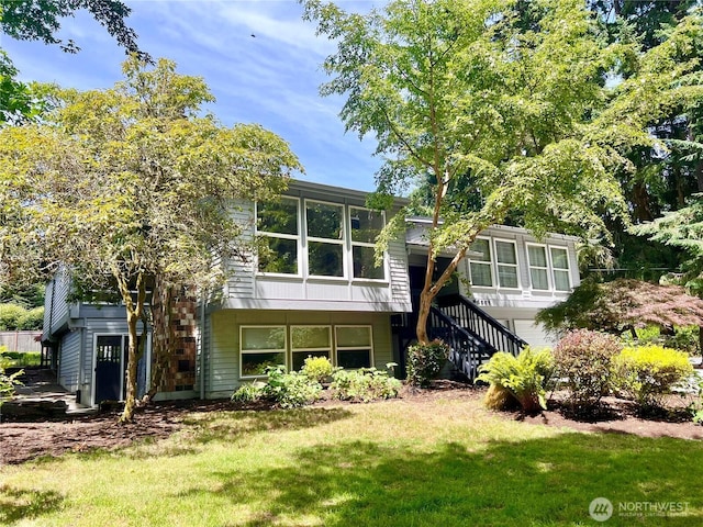 20801 Marine View Dr SW, Normandy Park, WA 98166 - rear view of house with stairs and a yard
