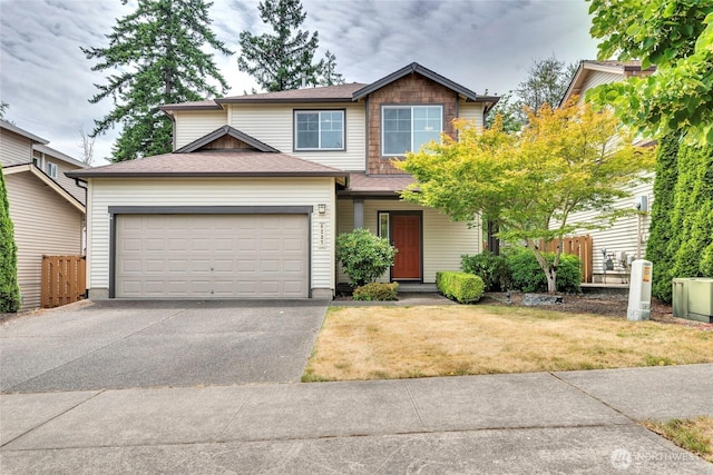 6237 Wesley Pl SE, Auburn, WA 98092 - view of front of property featuring asphalt driveway, a garage, and roof with shingles