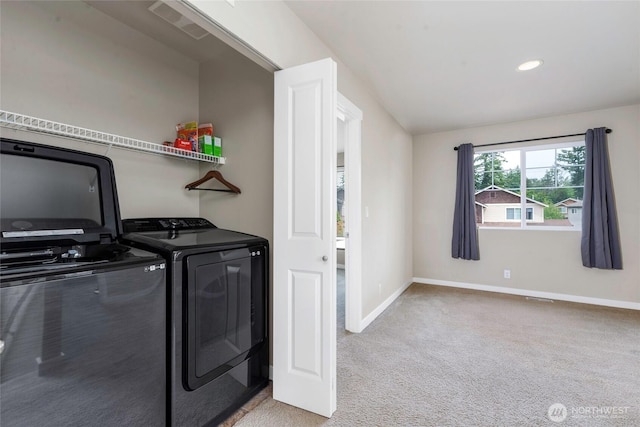 6237 Wesley Pl SE, Auburn, WA 98092 - laundry room featuring washing machine and dryer and light colored carpet