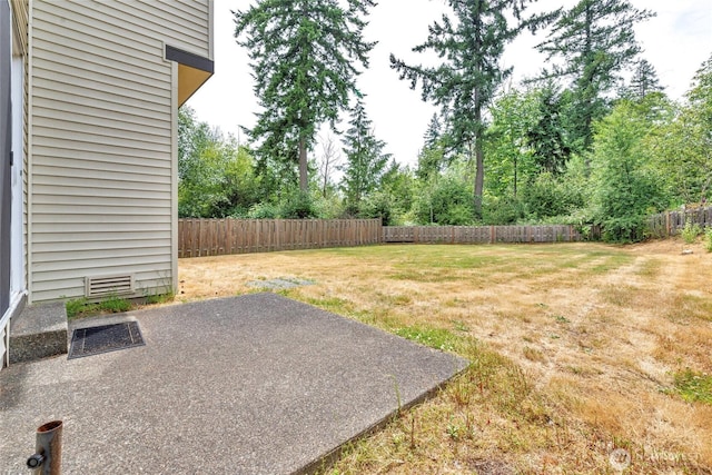 6237 Wesley Pl SE, Auburn, WA 98092 - fenced backyard with a patio area