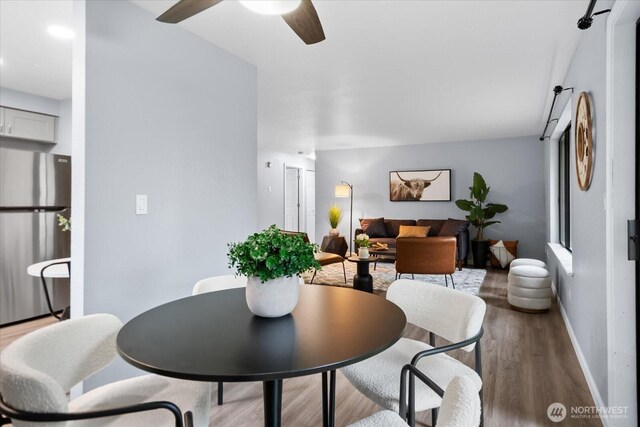 506 102nd Dr SE, Lake Stevens, WA 98258 - dining room with wood finished floors and a ceiling fan