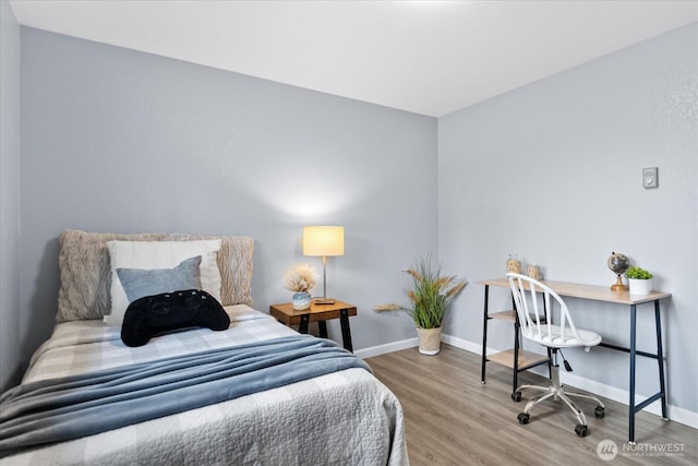 506 102nd Dr SE, Lake Stevens, WA 98258 - bedroom featuring wood finished floors and baseboards