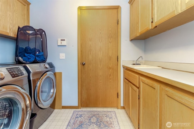 4706 56th St E, Tacoma, WA 98443 - laundry room with cabinet space, washing machine and clothes dryer, and light floors