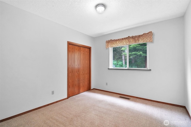 1931B State Route 505, Toledo, WA 98591 - carpeted spare room with baseboards and a textured ceiling