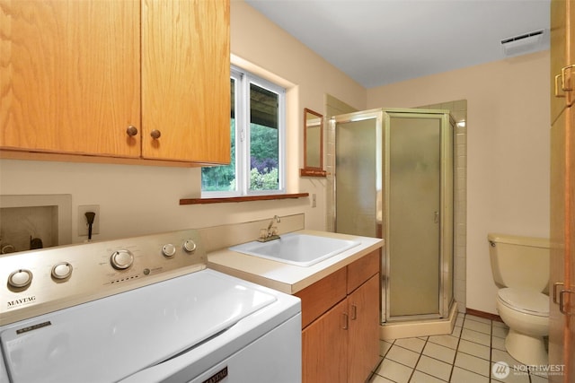 1931B State Route 505, Toledo, WA 98591 - laundry area featuring washer / clothes dryer and light tile patterned floors