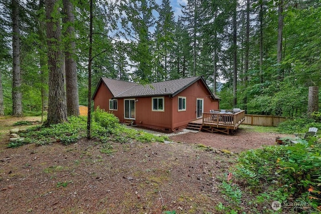 43920 SE 170th St, North Bend, WA 98045 - back of property featuring a wooden deck and a forest view