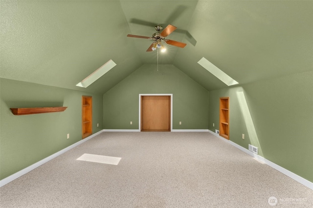 30630 24th Ave S, Roy, WA 98580 - bonus room with a skylight, a ceiling fan, carpet, and vaulted ceiling