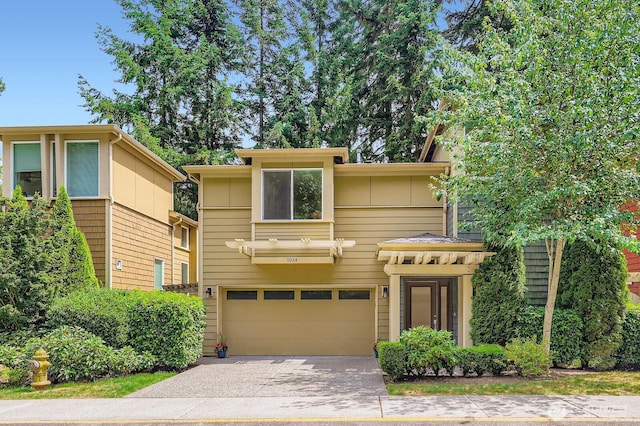 9064 177th Pl NE, Redmond, WA 98052 - view of front facade with concrete driveway and a garage