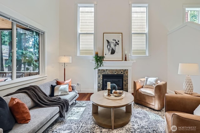 9064 177th Pl NE, Redmond, WA 98052 - living room featuring a brick fireplace and wood finished floors