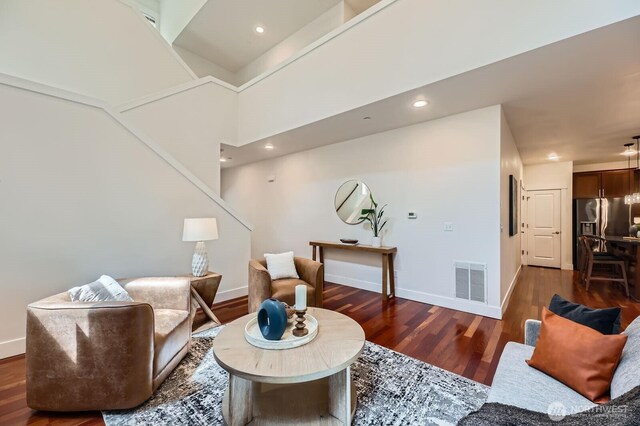 9064 177th Pl NE, Redmond, WA 98052 - living room featuring dark wood finished floors and recessed lighting