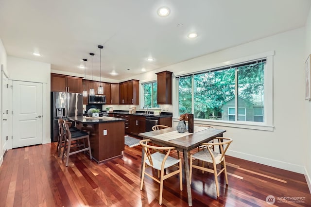 9064 177th Pl NE, Redmond, WA 98052 - dining area featuring dark wood finished floors and recessed lighting