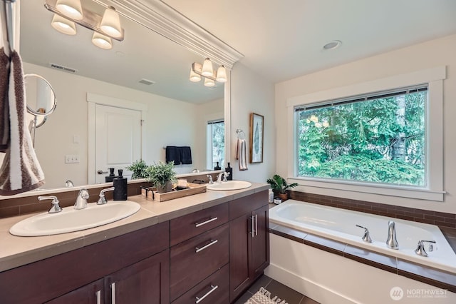 9064 177th Pl NE, Redmond, WA 98052 - bathroom with double vanity, a garden tub, and tile patterned floors