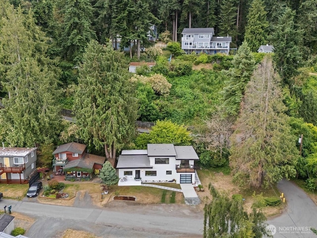 3704 Bells Ln, Langley, WA 98260 - aerial view of property and surrounding area with a heavily wooded area