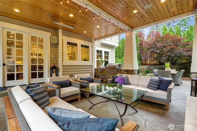 1709 223rd Ave SE, Sammamish, WA 98075 - view of patio / terrace with an outdoor hangout area, an outdoor kitchen, and outdoor dining space