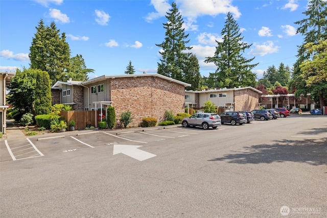 12240 SE 60th St Unit 41, Bellevue, WA 98006 - view of building exterior featuring uncovered parking