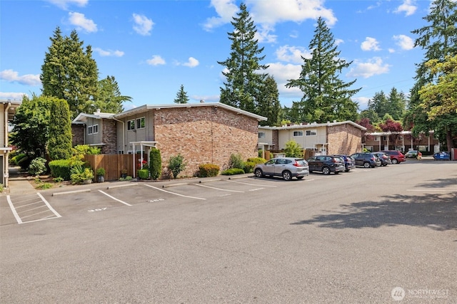 12240 SE 60th St Unit 41, Bellevue, WA 98006 - view of building exterior with uncovered parking