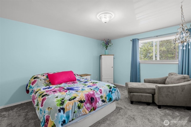 12240 SE 60th St Unit 41, Bellevue, WA 98006 - carpeted bedroom with baseboards and a chandelier