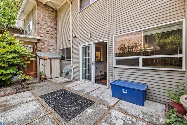 12240 SE 60th St Unit 41, Bellevue, WA 98006 - view of patio featuring a storage unit
