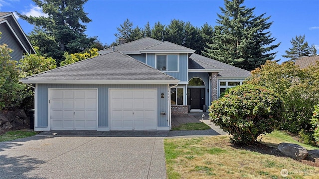 12607 SE 255th Pl, Kent, WA 98030 - view of front facade featuring concrete driveway, an attached garage, and a shingled roof