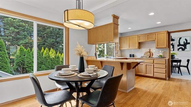 12607 SE 255th Pl, Kent, WA 98030 - dining space with light wood-type flooring, healthy amount of natural light, and recessed lighting