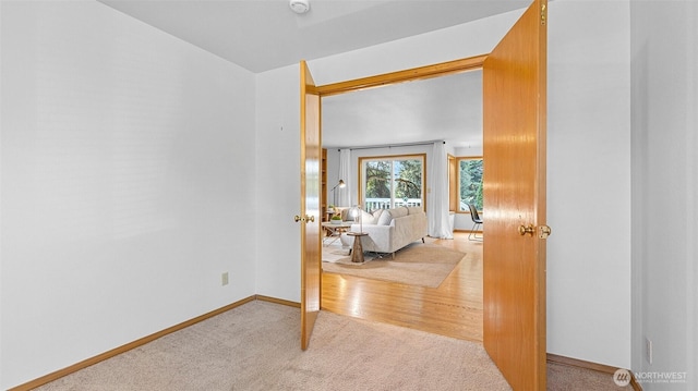 12607 SE 255th Pl, Kent, WA 98030 - corridor featuring light colored carpet and baseboards