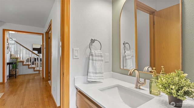 12607 SE 255th Pl, Kent, WA 98030 - bathroom featuring wood finished floors and vanity