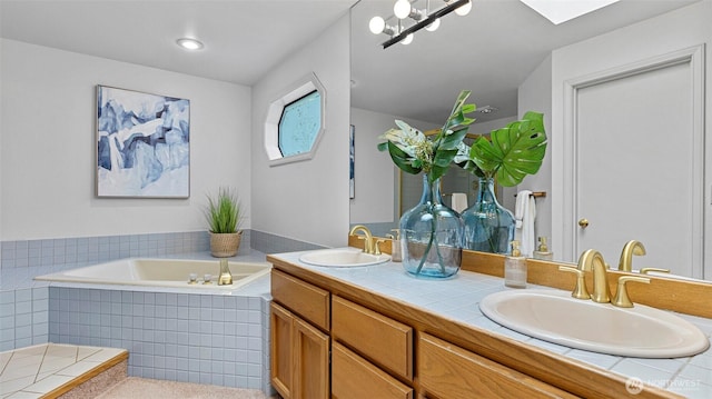 12607 SE 255th Pl, Kent, WA 98030 - bathroom featuring double vanity, a garden tub, and a skylight