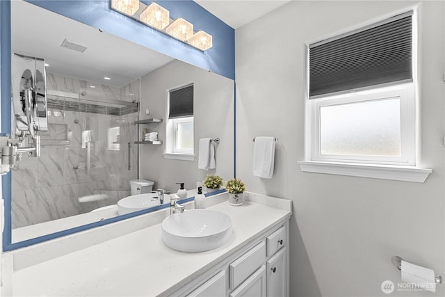 409 Davidson Blvd SW, Mattawa, WA 99349 - full bath featuring healthy amount of natural light, vanity, and a marble finish shower