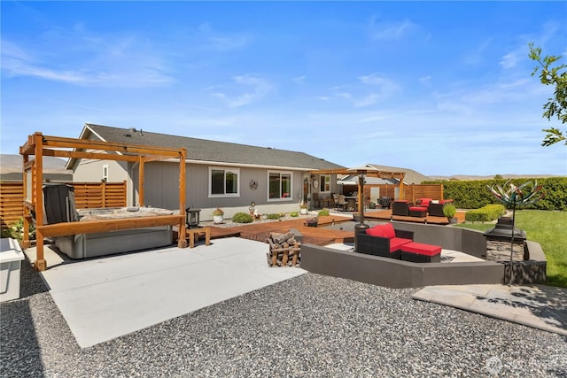 409 Davidson Blvd SW, Mattawa, WA 99349 - back of house with an outdoor hangout area, a patio area, a hot tub, and a pergola