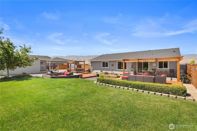 409 Davidson Blvd SW, Mattawa, WA 99349 - back of house with an outdoor hangout area, a pergola, and a deck